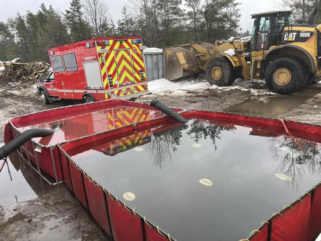 Crews from multiple Fire Depts. battle fire at waste management facility